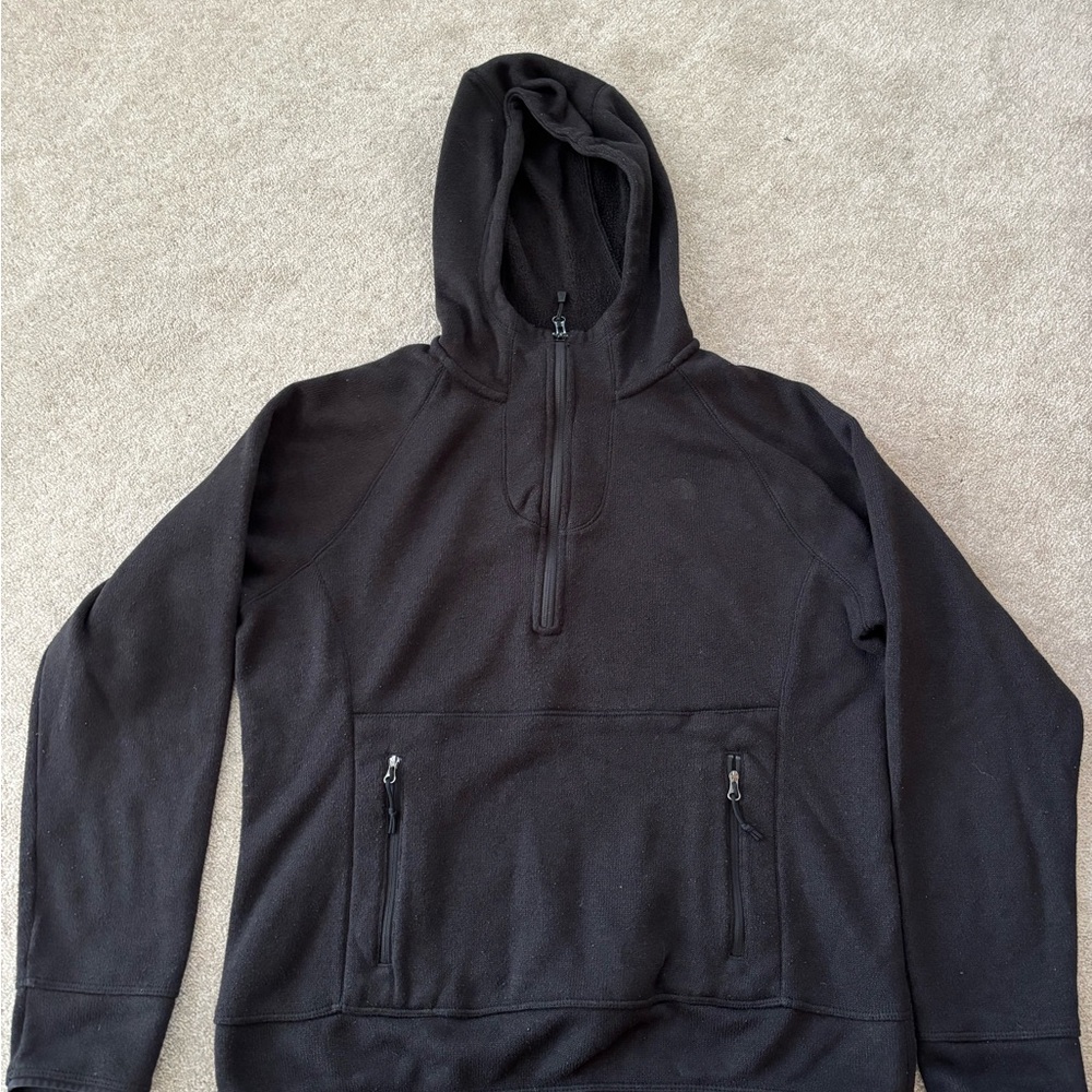 The North Face women’s quarter zip black hoodie.